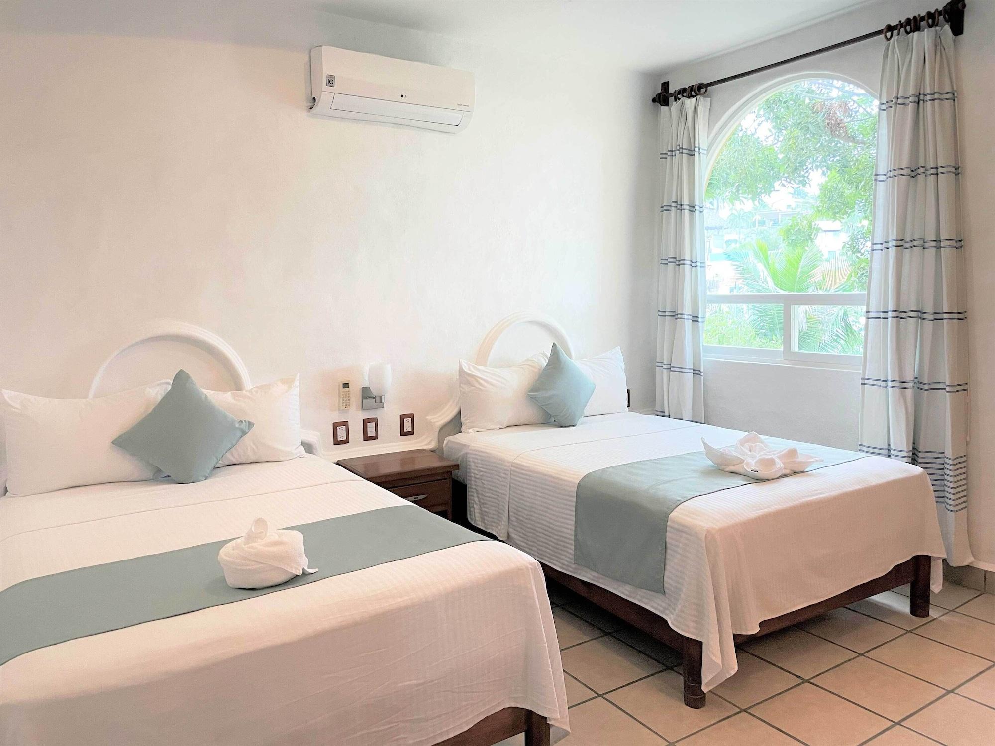 Villas & Resort Luz De Luna Santa Cruz Huatulco Bagian luar foto